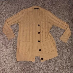 Long cable knit button up pocketed cozy comfy cardigan sweater